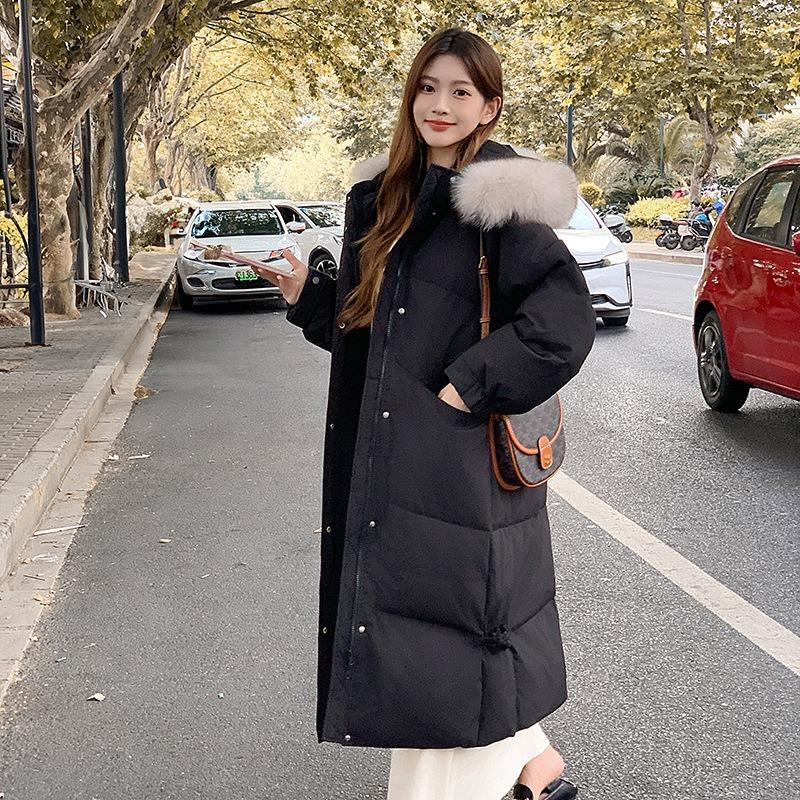 Down cotton-padded clothes, new big fur collar, long knee-length cotton-padded clothes, thickened fashionable winter cotton-padded jacket.