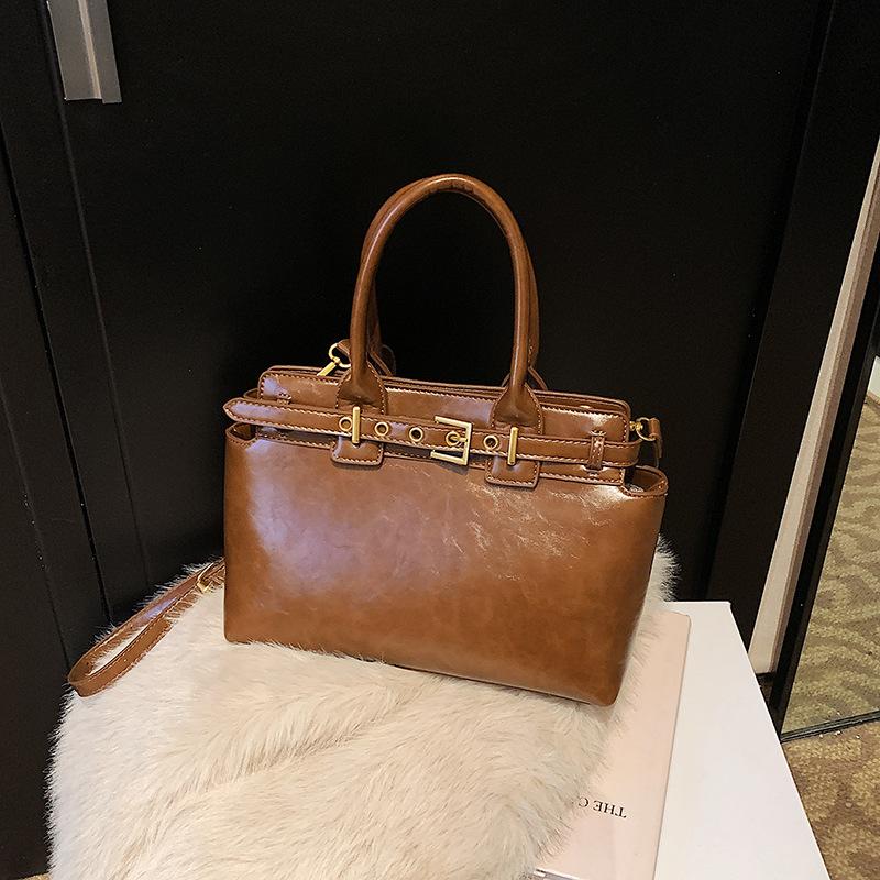

Premium sense retro handbag bag women s bag 2025 winter new commuter shoulder bag large capacity tote bag коричневый