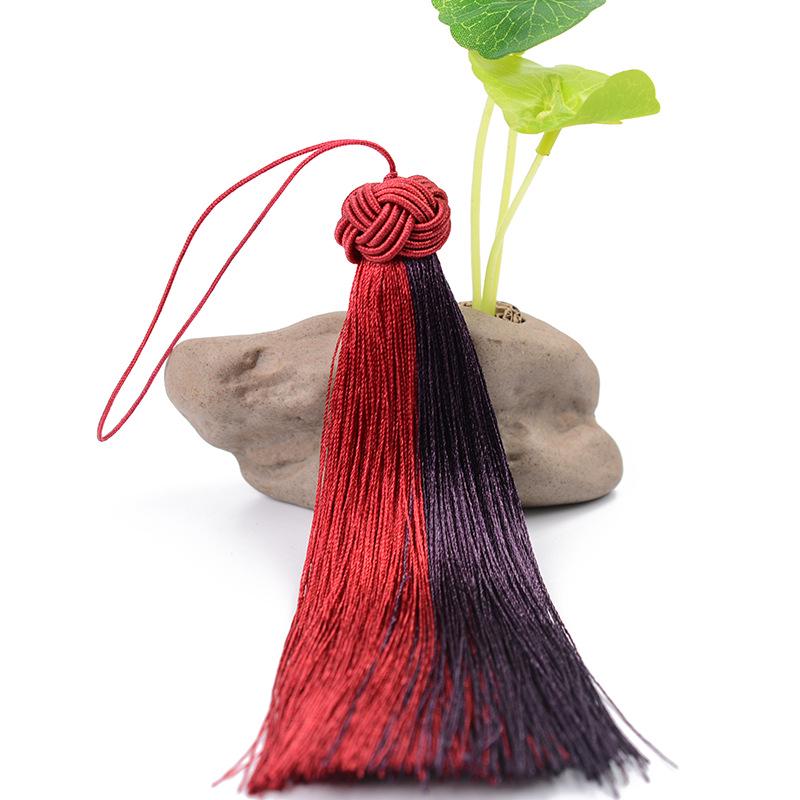 

Двухцветная закладка-кисточка с узором «Узел дракона» ручной работы — не выцветает и не сгибается