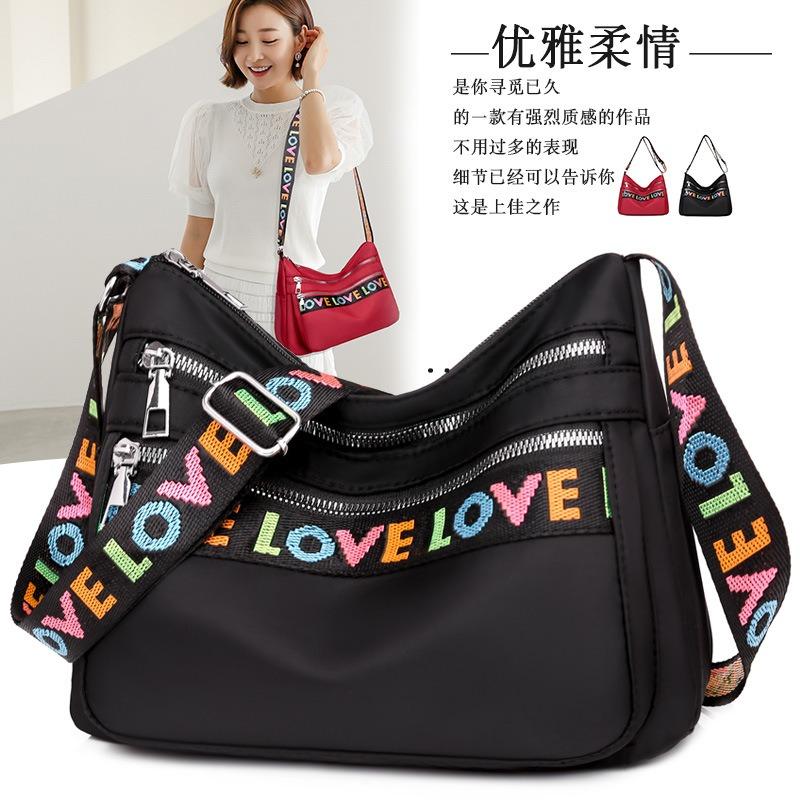 Oxford cloth messenger bag shoulder bag large capacity multi-pocket bag women's new fashion letter flow