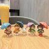 Cartoon Character Desk Ornament: Cute Umbrella-Holding Figure for Creative Office Decor