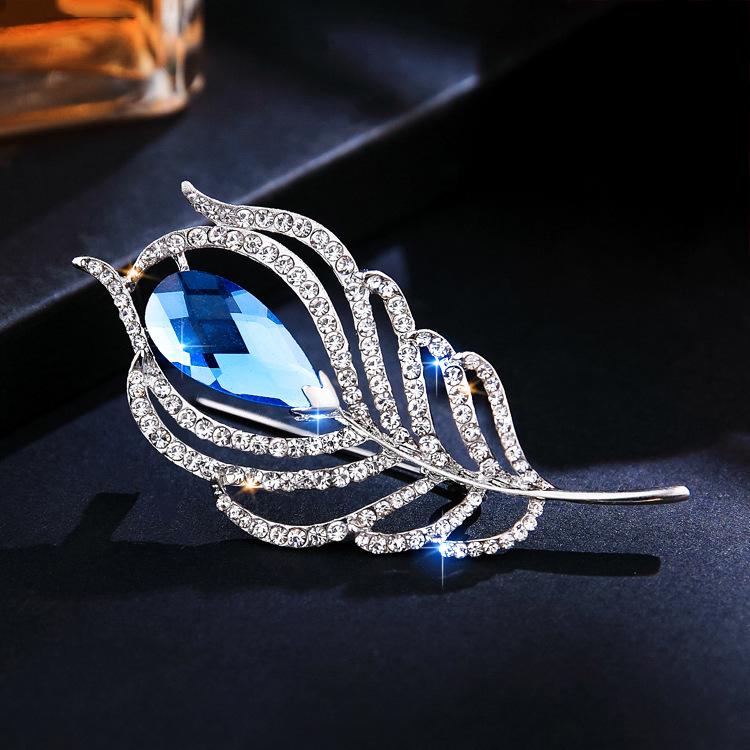

Korean Peacock Feather Brooch: Women s Versatile Faux Crystal Pin & Fashion Accessory