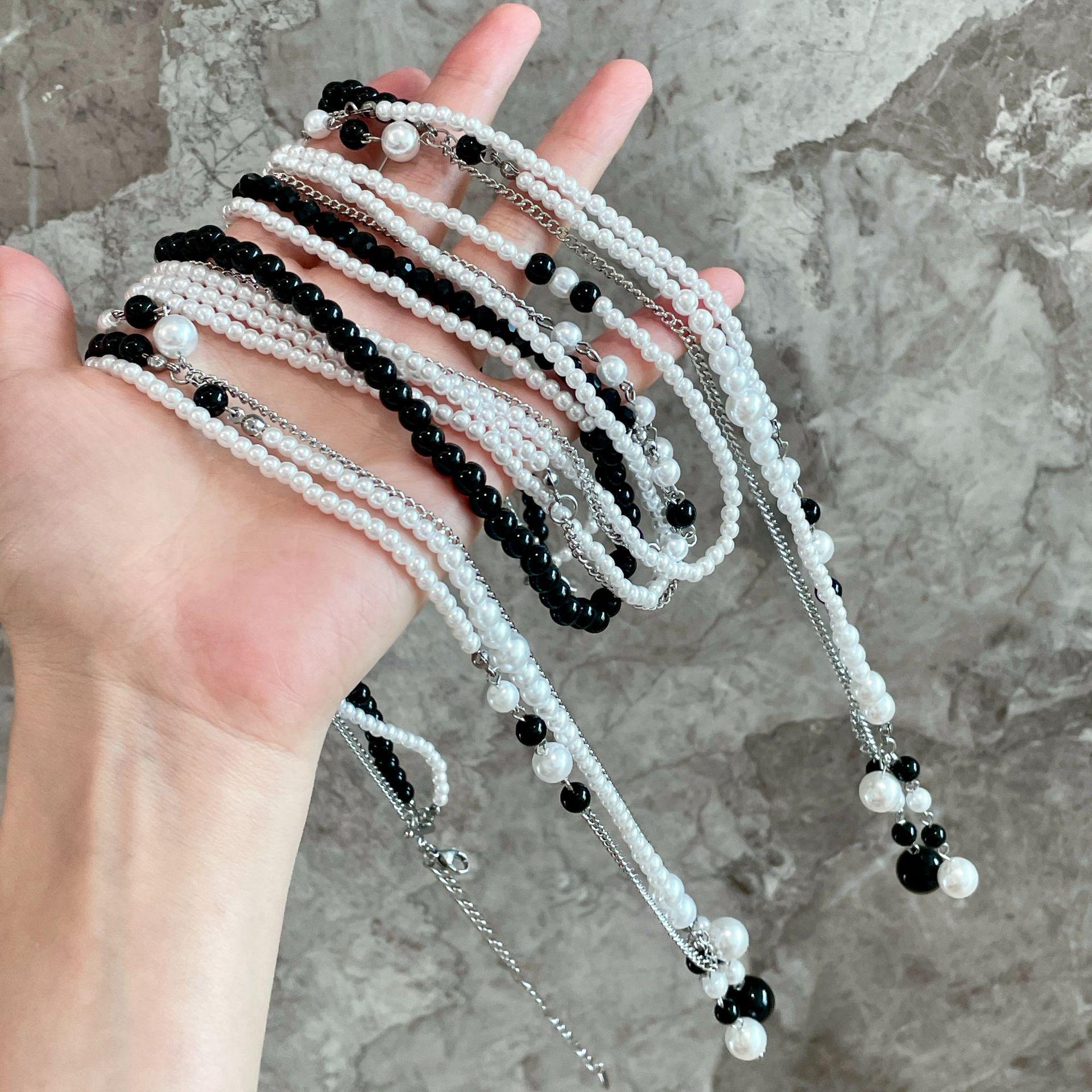 Элегантное колье-чокер с кисточкой из черного и белого жемчуга - Универсальный женский аксессуар