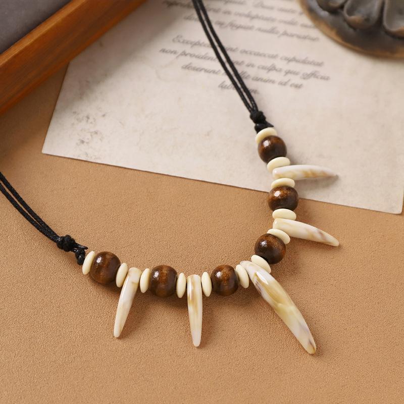 1 Stück Modisches Imitation Zähne Perlen Halskette Seil Geflochten Imitation Wolfszähne Halskette Surfer Verstellbare Länge Halskette Amulett