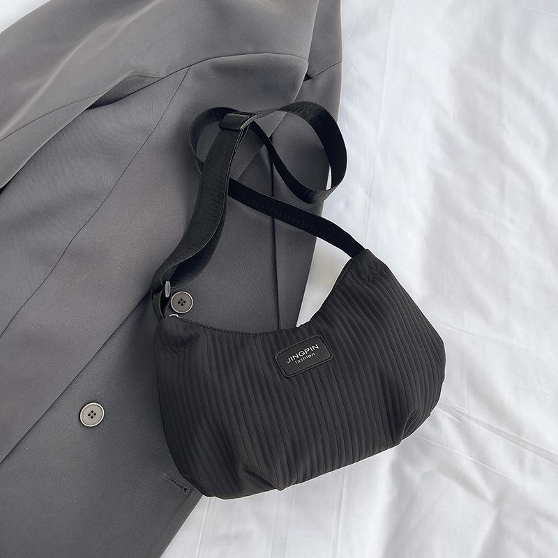 Large-capacity Spring and Summer Simple Shoulder Bag with Side Pocket for Carrying On The Shoulder or Across The Body Casually