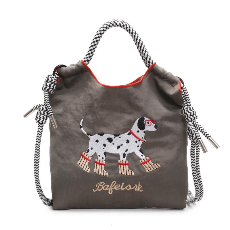 Fashion high-value bag women's new textured embroidered portable nylon mobile phone bag cartoon shoulder messenger bag