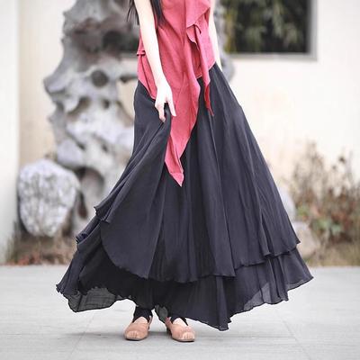 Falda maxi midi de doble capa con vuelo, confeccionada en Tencel Bamboo de tonos fríos, colección primavera/verano.