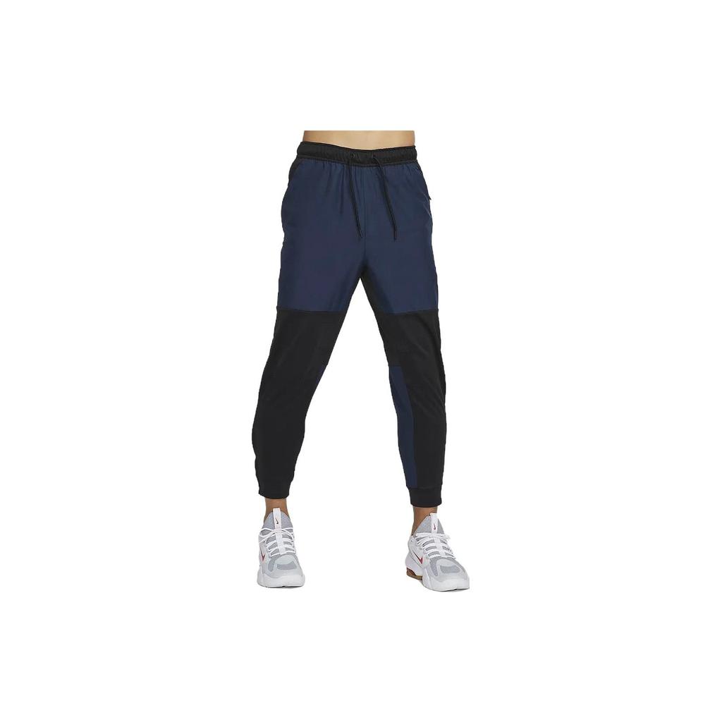 Nike Luźne zwężane joggery ze sznurkiem Męskie spodnie Czarny FB8602-010