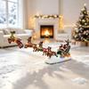 Julren och släde med Jultomte-prydnader