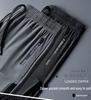 Men's Summer Ice Silk Jogger Pants - Casual, Loose, Versatile, Air Conditioning, Sports Pants with a Straight Leg Design.