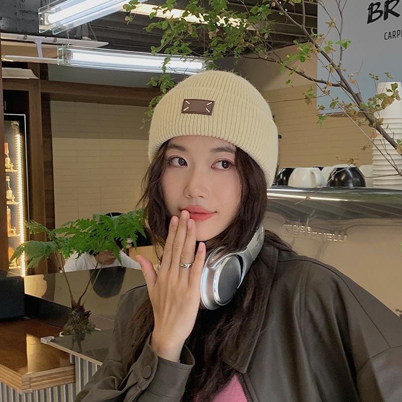 Winter new thick wool knitted hat warm versatile bag head hat flanged ear protection fashion wool hat women's cold hat