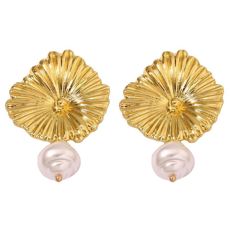 

Ретро и минималистичные серьги с жемчугом в виде листьев лотоса. Универсальные женские нишевые серьги и серьги с жемчугом для путешествий и темперамента.