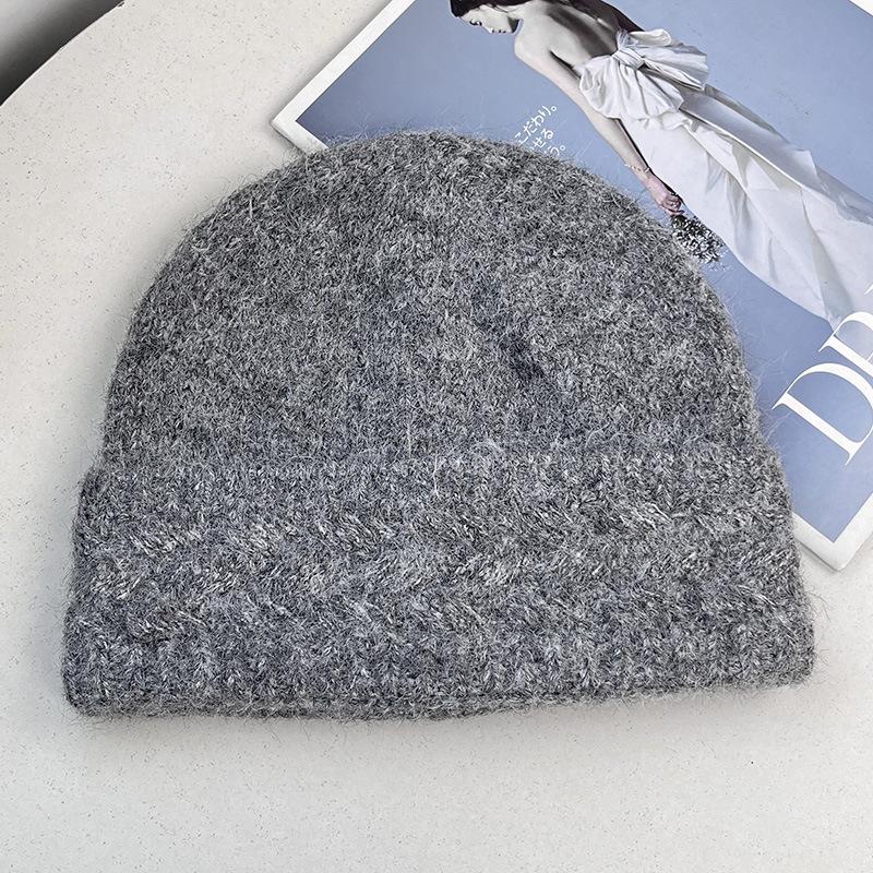 Autumn and winter new acrylic fiber knitted warm and comfortable wool hat women's daily commuting versatile face small temperament stacking hat