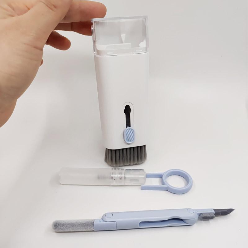 Q6E7 7-in-1 Multifunctional Cleaning Tool Set: Keyboard, Earphone, and Phone Dust Remover.