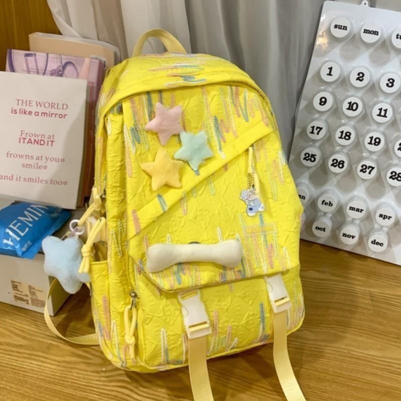 

JK Schoolbag Junior High School Student Ins Cute High School Student All-Match Backpack Elementary School Student Simple Fresh Backpack Yellow large + star + bone + pendant