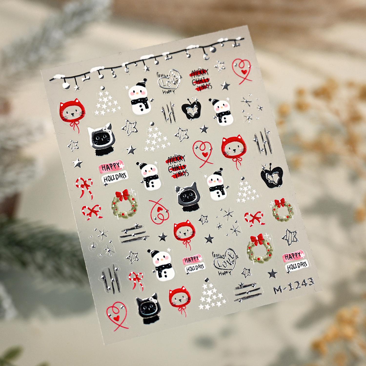 

Adesivos de Unhas Natalinos: Gatinho de Prata, Boneco de Neve, Guirlanda e Coração - M1243