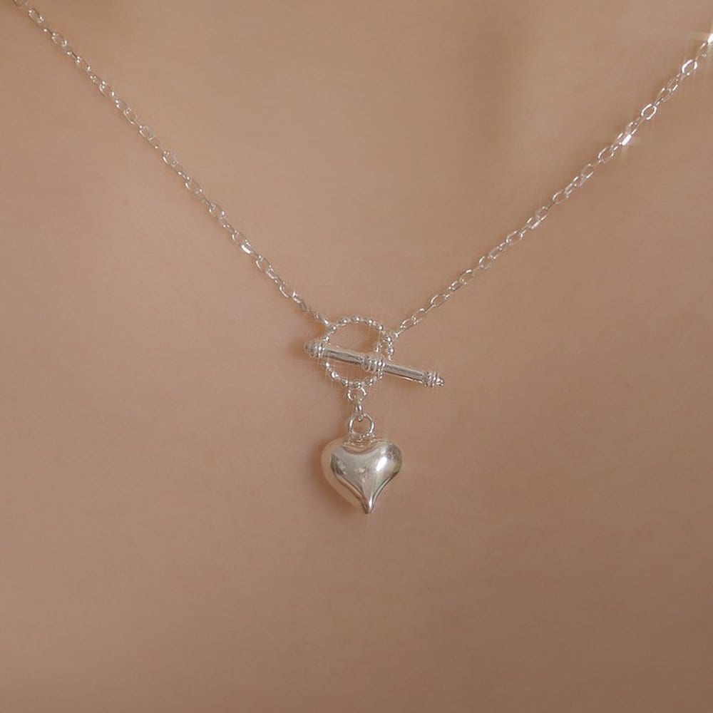 

92.5 Silver Ante Toggle Bar Heart Necklace W gold