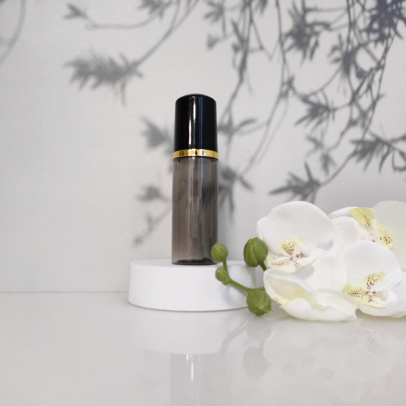 Available 60ml Transparent Black Foam Mousse Bottle for Face Wash and Travel-friendly Cosmetic Packaging.