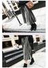 Elegant Pleated Mid-Length Skirt: Spring/Autumn, Solid Color, Elastic Waist, Loose Fit, Plus Size.