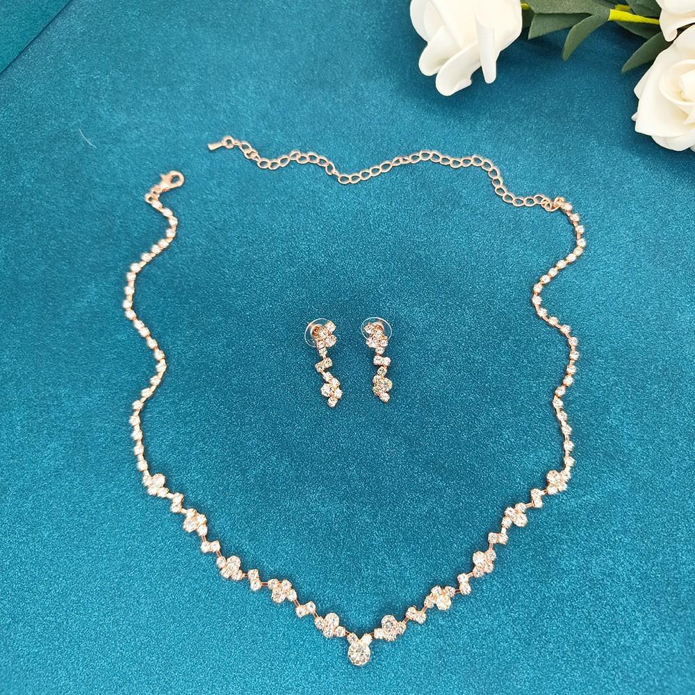 Three-piece Minimalist and Fashionable Jewelry Set. Bride's Necklace. Elegant Accessory.