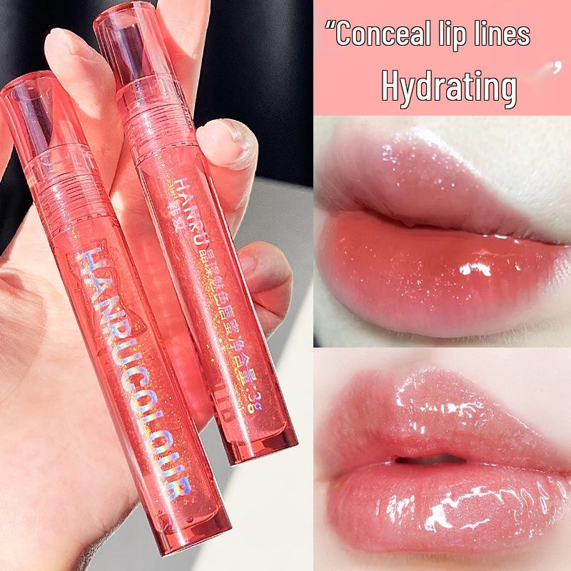 

Han Rujing Crystal Lip Gloss: Watery Moisturizing with Pearlescent Shimmer, Jelly-like Glass Finish, Transparent Balm for Smooth Lips.