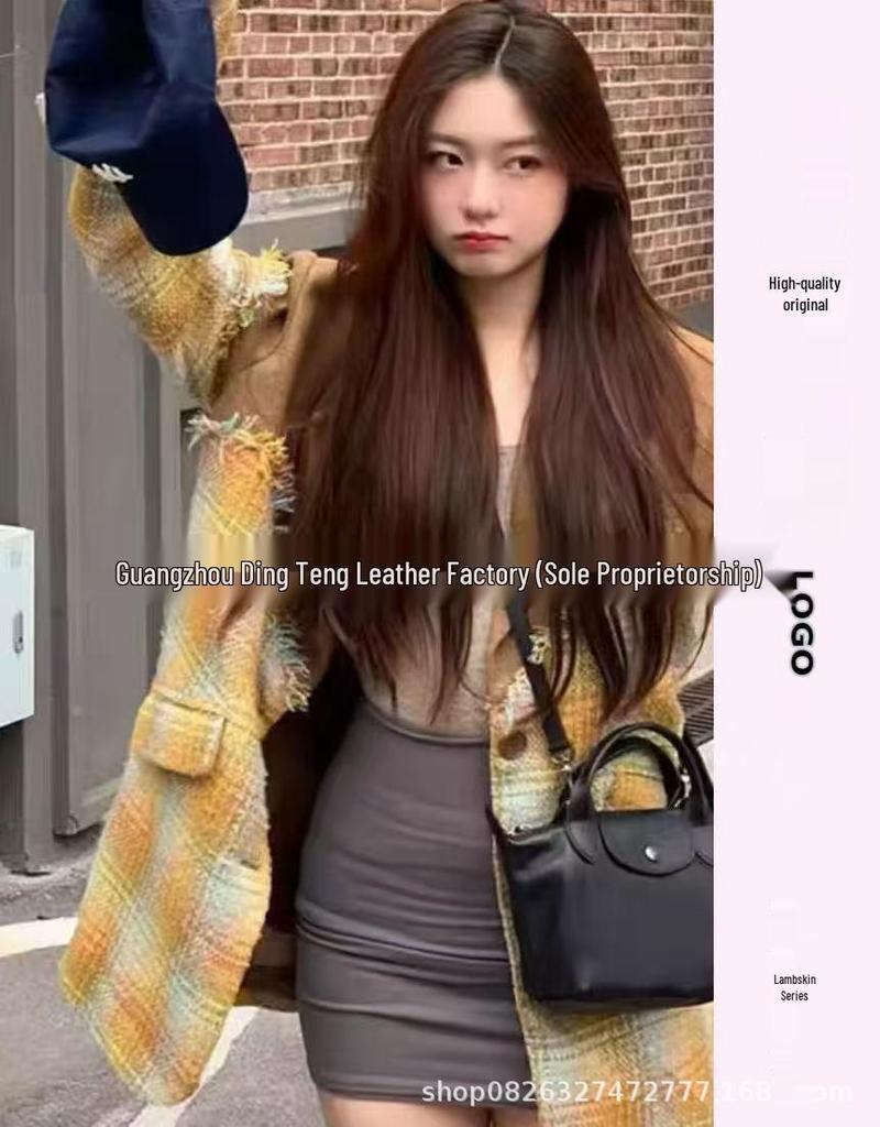 Hochwertige Mini-Knödeltasche aus Nappaleder mit Drachenprägung, Vielseitig für den Weg zur Arbeit, zum Tragen in der Hand, über der Schulter, mit verstellbarem Crossbody-Riemen.