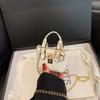 Korean version of girls' crossbody portable small square bag summer new personalized classic children's hand carry one shoulder crossbody bag