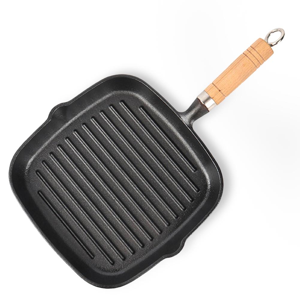 Parrilla de hierro fundido antiadherente de 9,25 pulgadas con mango de madera para cocinar en interiores y exteriores.