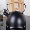 Black Steel Kettle with Whistle for Boiling Water on the Stove