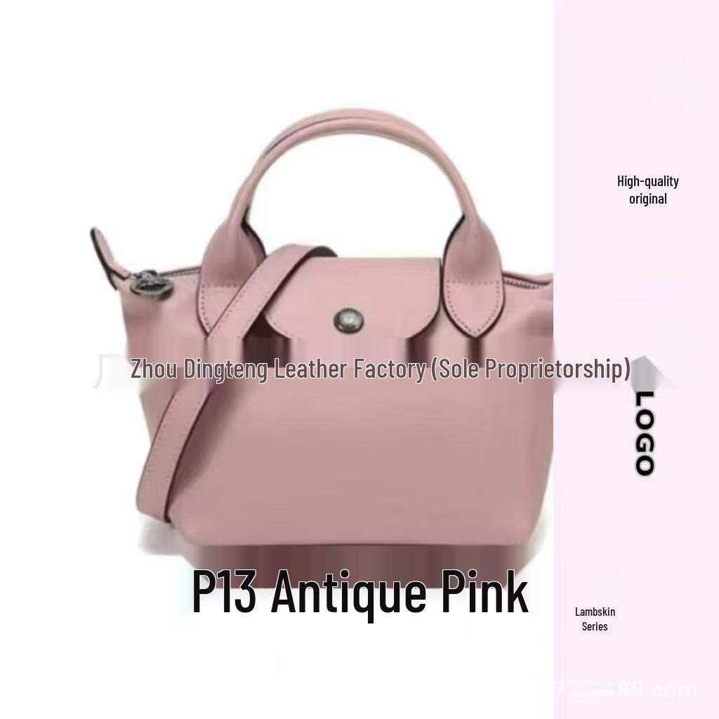 Hochwertige Mini-Knödeltasche aus Nappaleder mit Drachenprägung, Vielseitig für den Weg zur Arbeit, zum Tragen in der Hand, über der Schulter, mit verstellbarem Crossbody-Riemen.