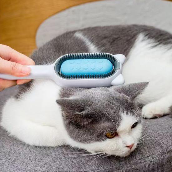 

Самоочищающаяся щетка для кошек 2-в-1, двусторонняя закругленная головка щетки, средство для удаления распущенных волос, расческа для ухода за домашними животными в мультяшной форме розовый