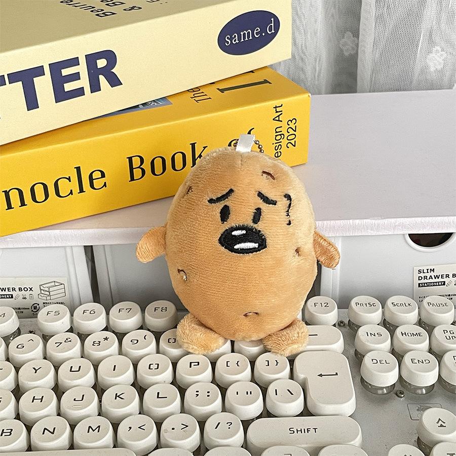

Cute Southern Small Potato Plush Doll Pendant Emotional Doll Gift Worker Office Small Ornaments Height about 10cm