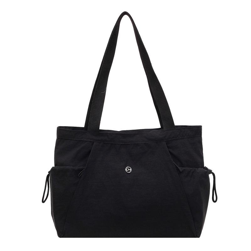 

Casual nylon bag female large-capacity student class hand-held canvas bag simple and versatile commuter shoulder tote bag чорний