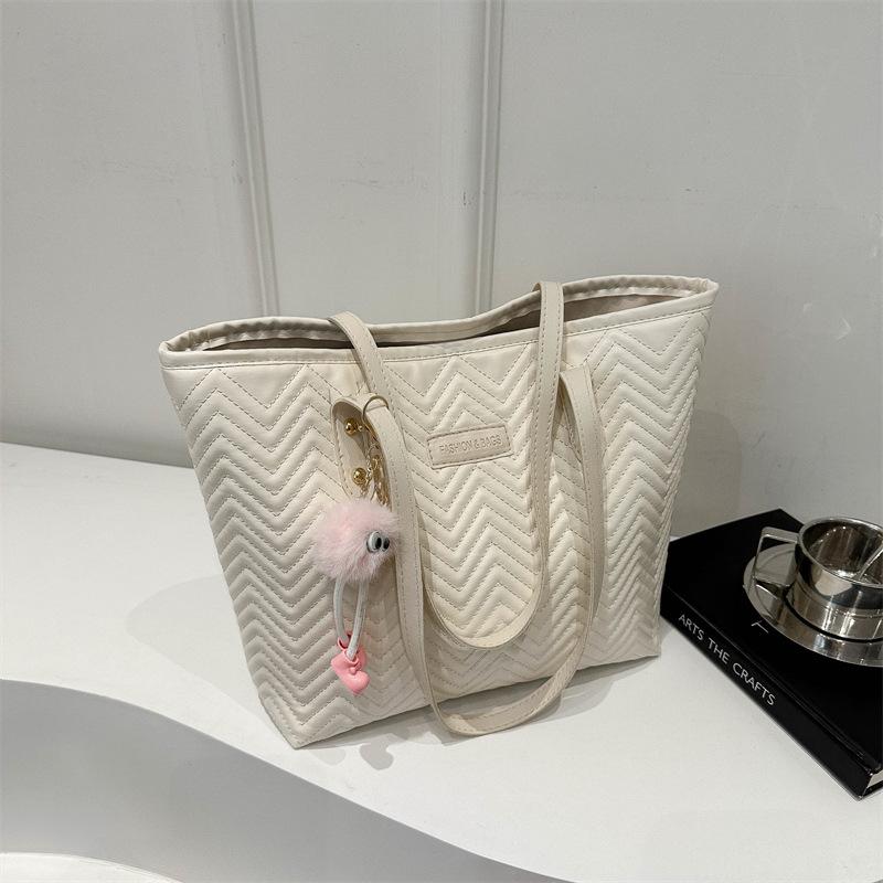 

Water ripple sewing line tote bag women s bag 2024 new simple large-capacity shoulder bag solid color niche handbag no pendant білий