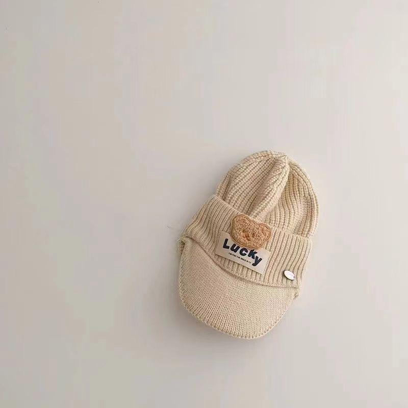 New autumn and winter children's hats, knitted ear protectors, peaked caps, cold-proof wool pullovers, baseball caps, fashion thermal caps