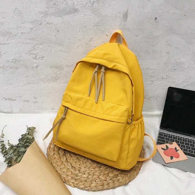 

Новий корейський стиль однотонний повсякденний рюкзак простий однотонний студентський унісекс шкільний рюкзак жовтий