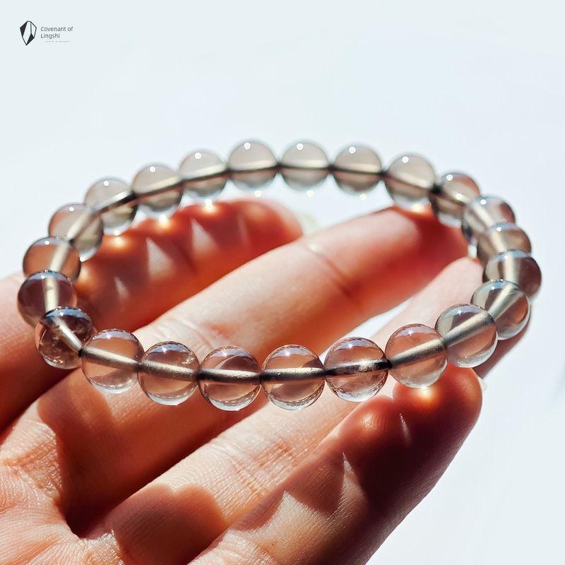 

Линши о браслете из натурального кристалла, черного кристалла, мужском и женском, черничном, чайном, дымчатом кристалле, из необработанного камня, необработанной руды, черном браслете, украшении Tea crystal is about 8mm (origin Wulian, Shandong)