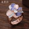 New enamel geometric four-leaf clover elastic ring, women's fashion high-end flower alloy ring