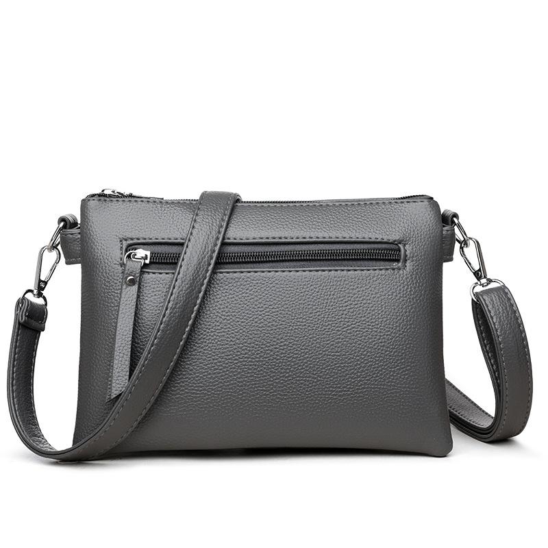 Fashionable and Fashionable Texture Middle-aged Woman Holding A Small Bag In Her Hand  Simple and Versatile One-shoulder Crossbody Bag