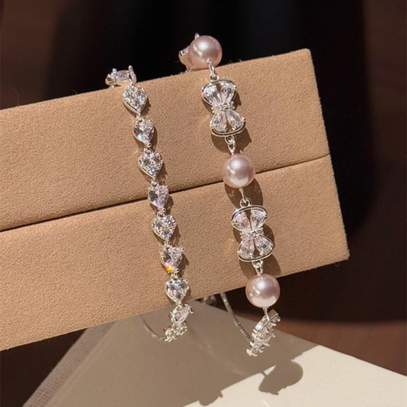 Zircon Bow Pearl Bracelet: Heart Light Collection - Fashionable, Versatile Wrist Accessory for Women
