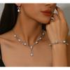 Set of Bridal Crystal Accessories - Necklace, Earrings. Two-piece Wedding Dress. Women's Style.