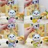 Sleutelhanger met panda-hoofddoek en pluche design, modieus voor kinderen en verzamelaars.