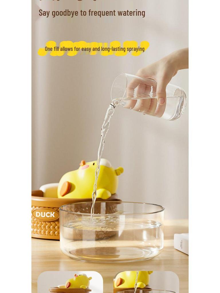 Creative Yellow Duck Mini Air Humidifier: 2-Speed, Long/Intermittent Spray for Desktop & Home Use