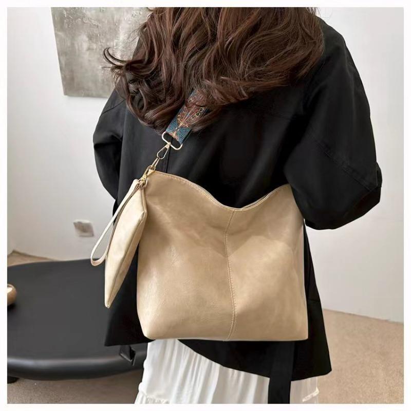 Cheap new fashion portable shoulder women's bag large capacity bucket bag solid color versatile mother and child bag leather