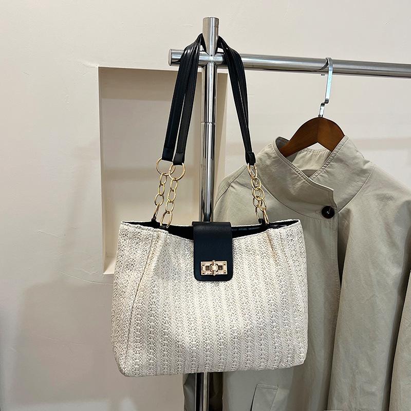 

Hand-woven straw bag women s 2025 new seaside high-end niche design messenger bag portable tote bag чёрный