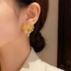 Chic Metal Hollow Bow Earrings: Unique European & American Cool Style
