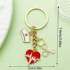 Heart-shaped Syringe Stethoscope Keychain with Nurse Cap Pendant Ornament