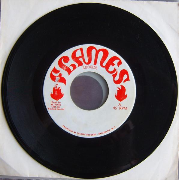 

7-дюймовая пластинка RANKING TREVOR Back Whe Baldhead NONE Flames Records 1977 США Регги Ска Даб Б/у