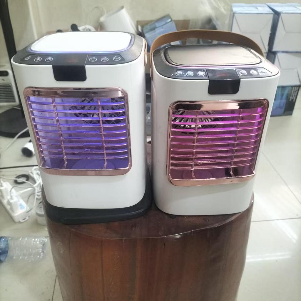 Second Generation Portable Mini Cooling & Humidifying Fan with Negative Ion Desktop Feature