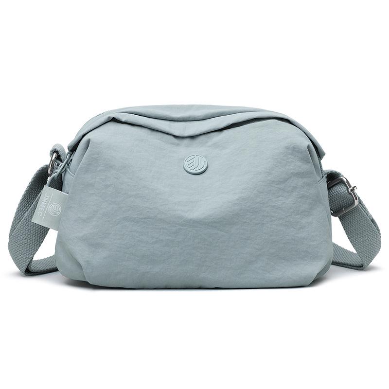 

Women s Large Capacity Water-Resistant Nylon Crossbody Bag - Trendy 2025 Design and Simple Style 24x12x15 cm світло-синій колір